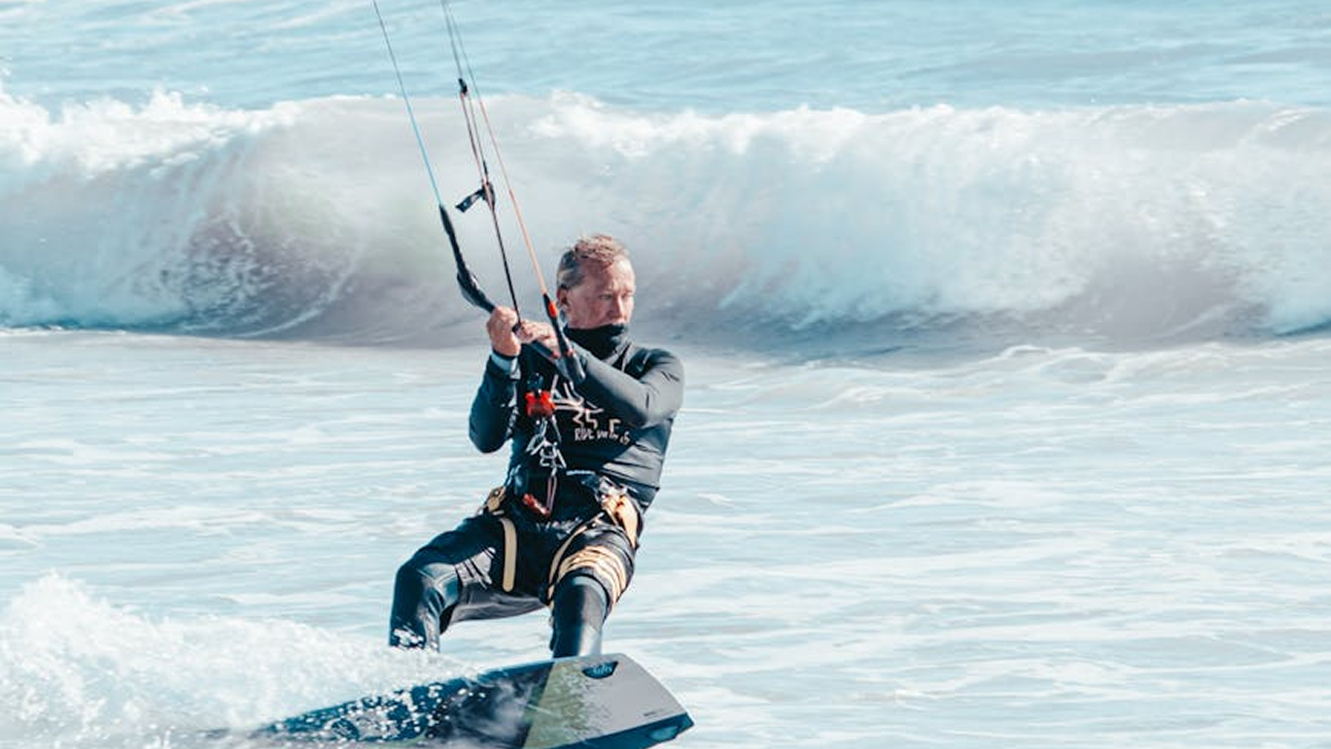 Aerial view of Cape Hatteras showing flatwater sound on one side and ocean waves on the other